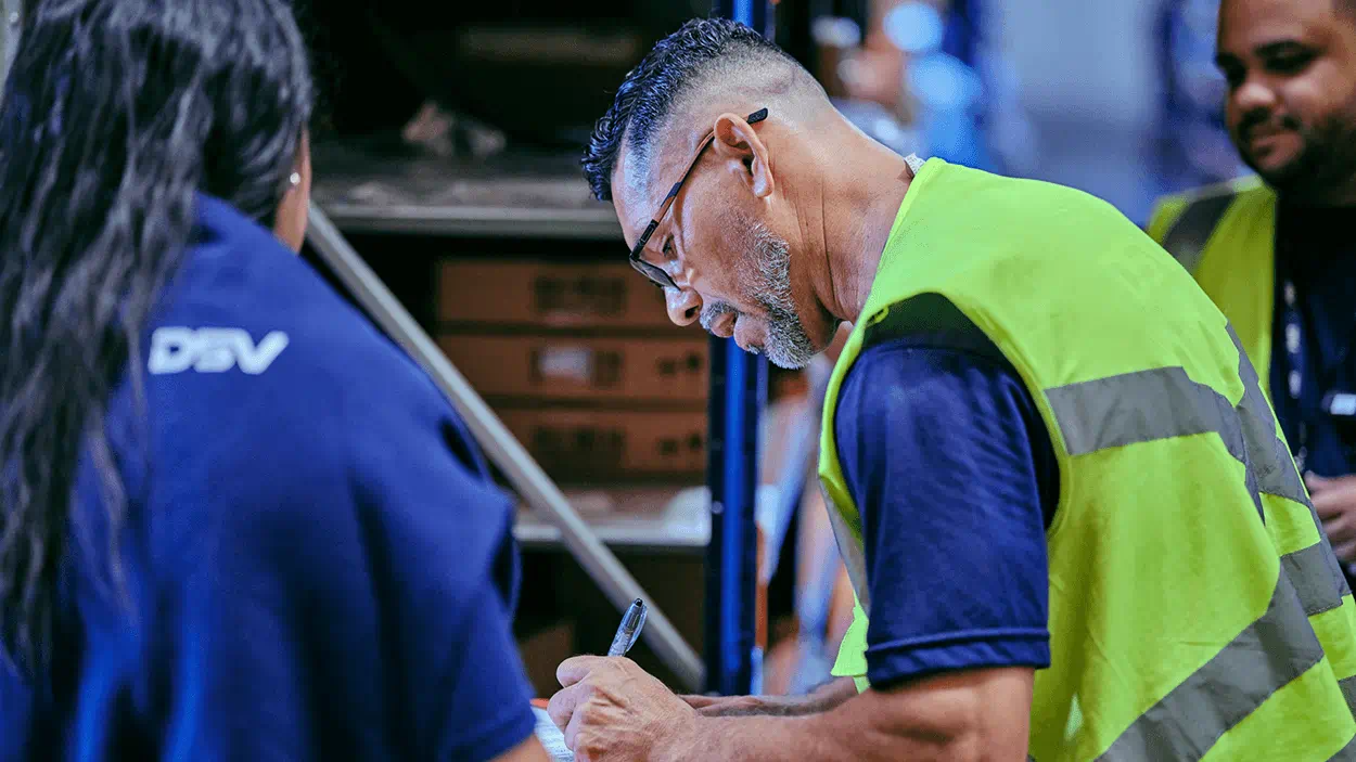 Man signing document